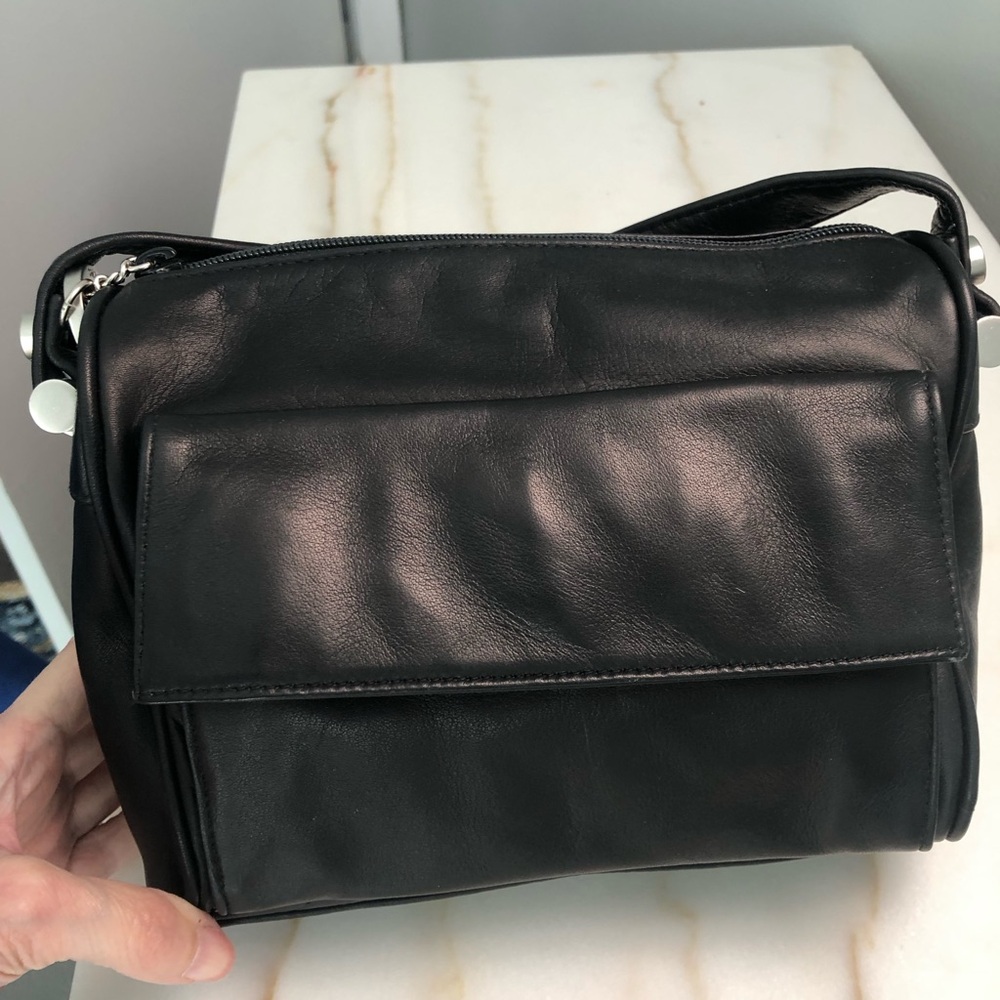 Perlina NWOT black messenger bag. Genuine leather.